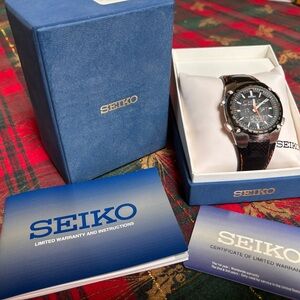 Rare Seiko Sportura SNJ007 Black Dial Watch with Orange Details